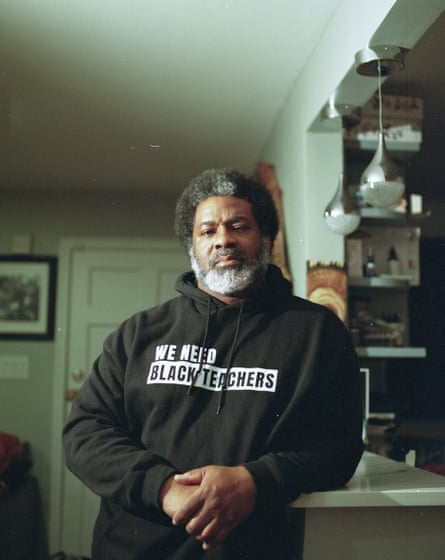 Portrait of Sharif El-Mekki wearing a hoodie that reads: ‘We need Black teachers’.