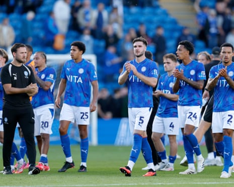 Stockport celebrate at full time.
