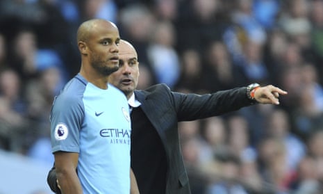 Is Pep Guardiola about to point Vincent Kompany to the exit door after leaving him out of the Manchester City squad that was crushed in Barcelona?
