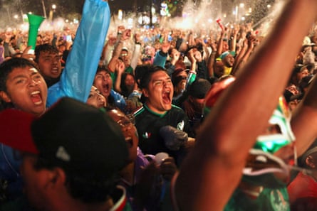 Mexican football watch their game against England.