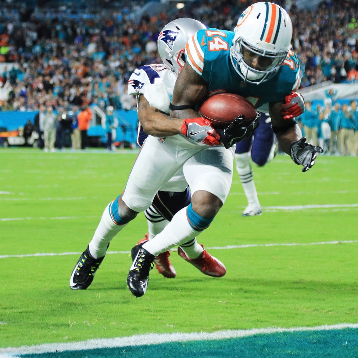 Tom Brady intercepted twice as Miami Dolphins shock New England Patriots | NFL | The Guardian