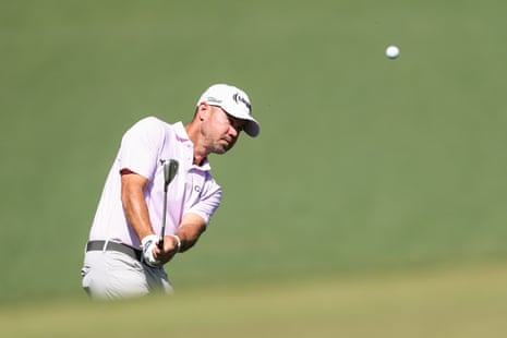Brian Harman chips from the fairway at the seventh.