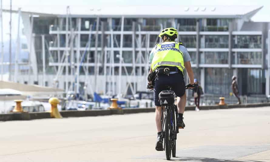 A police officer on patrol during the first day of a nationwide lockdown on March 26, 2020 in Wellington