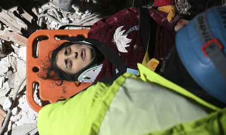 A woman rescued by the search and rescue personnel after 69 hours from under rubble of a collapsed building following the 7.7 and 7.6 magnitude earthquakes in Kahramanmaras, Turkey.