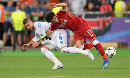 Sergio Ramos drags Mohamed Salah to the turf