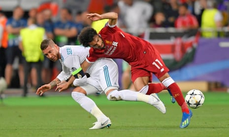 Sergio Ramos appears to press Mo Salah’s right arm to his body, ending the Liverpool striker’s participation in the Champions League final which Real went on to win 3-1.