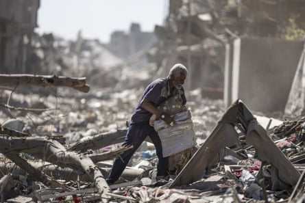 Huge amounts of rubble and a man