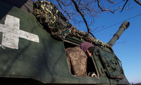 Ukrainian serviceman is seen at a position in a frontline in Donetsk region.