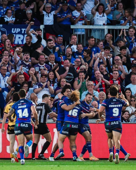 Isaiah Vagana of Wakefield Trinity celebrates with teammates after scoring a try against Castleford Tigers on 24 July 2026.