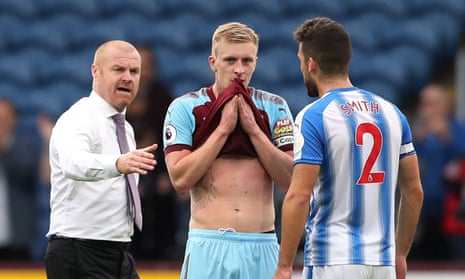 Sean Dyche shakes hands with Huddersfield captain Tommy Smith after the match. Dyche described Rajiv van la Parra’s dive as “unacceptable”.