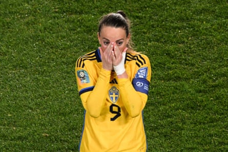 Kosovare Asllani wipes tears from her eyes.
