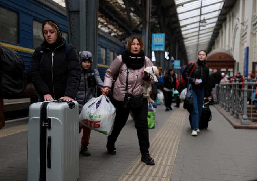 People arrive at the main train station in Lviv on the train from Zaporizhzhia. Lviv has served as a stopover and shelter for the millions of Ukrainians fleeing the Russian invasion.