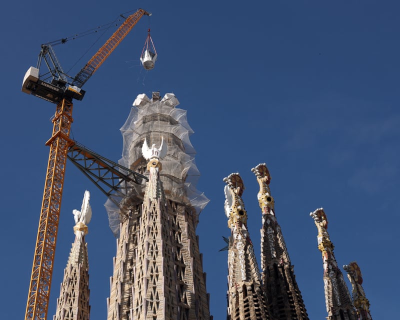 ‘A joyful day’: the final piece of Sagrada Familia’s central tower is put in place.