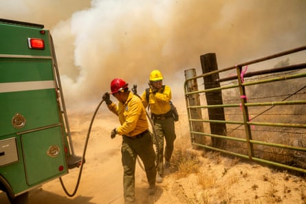 US Forest Service firefighters battling the Madre Fire, a massive wildfire that broke out in San Luis Obispo county in early July.
