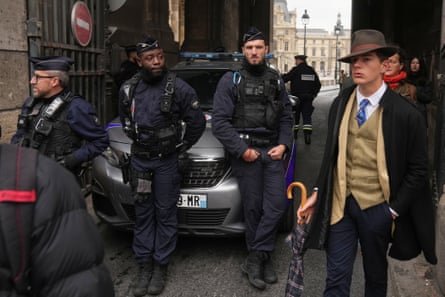 Police officers block an access to the Louvre museum after a robbery on 19 October 2025.