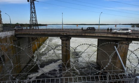 A file photo taken on May 20, 2022, shows a road bridge at the Kakhovka hydroelectric power plant in Kherson.