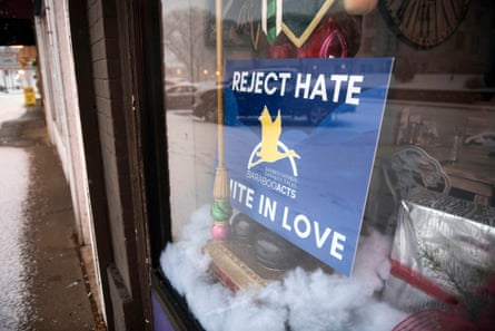 The 12,000 person town of Baraboo, Wis. has become the focus of international attention for a photo of high school boys making what appears to be a Nazi salute after the image went viral. The community has held town meetings to address the issue and handed out signs like this one, seen in a storefront on 4th Ave. downtown Dec. 31, 2018, that says “Reject Hate, Unite in Love.” Photo by Lauren Justice