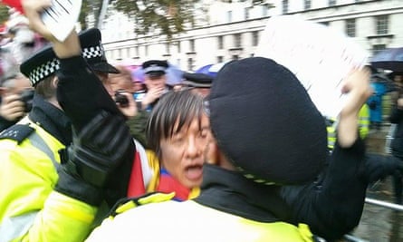 A still from the video of Shao Jiang’s arrest in London for protesting during President Xi’s state visit in 2015.