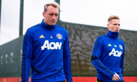 Phil Jones, left, is at best the fourth-choice central defender but Scott McTominay has been preferred to the more senior Nemanja Matic.