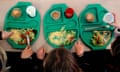Aerial image of children eating school meals