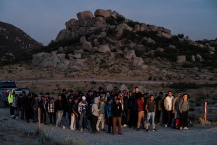 Migrants line up at Jacumba Hot Springs in California