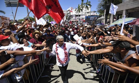 Andrés Manuel López Obrador is greeted by supporters during a campaign rally in Acapulco, Guerrero state, Mexico, on Monday.