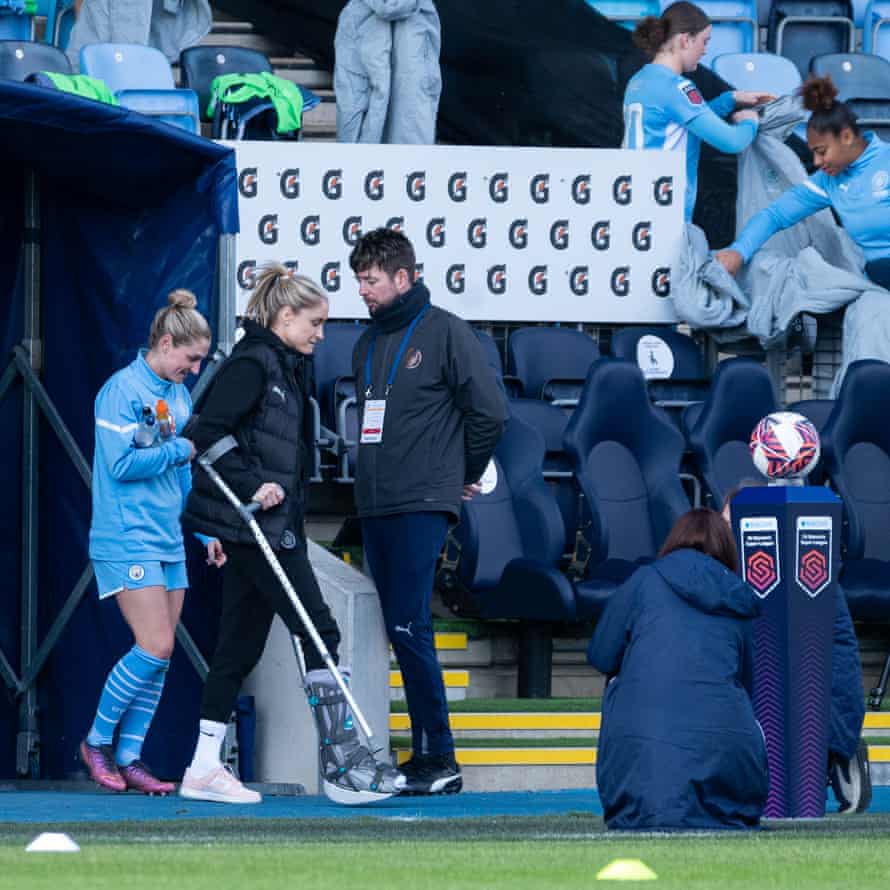 Club captain Steph Houghton makes her way to her seat before the match.
