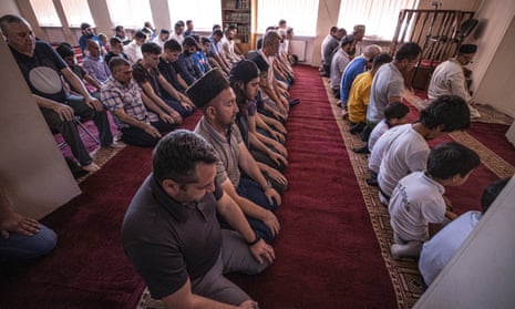 Muslims perform Eid al-Adha prayer in Dnipro, Ukraine.