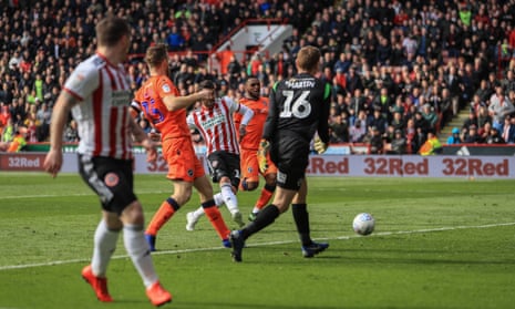 Gary Madine slots the ball home in the 51st minute to give Sheffield United the lead.