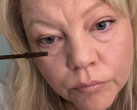 Sabine Wiesel applying mascara