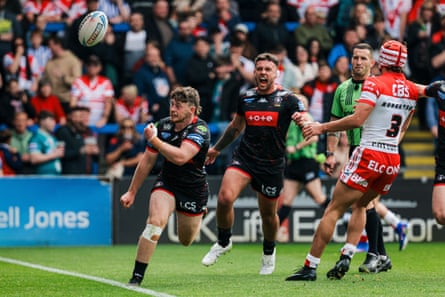 Jack Farrimond celebrates after scoring Wigan’s first try.