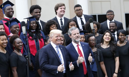 President Donald Trump poses with Liberty University president, Jerry Falwell Jr. in 2017.