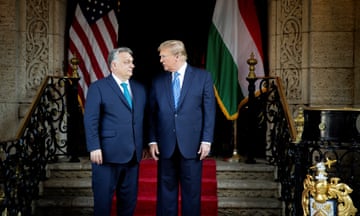 Orbán with Trump on red-carpeted steps at Mar-a-Lago
