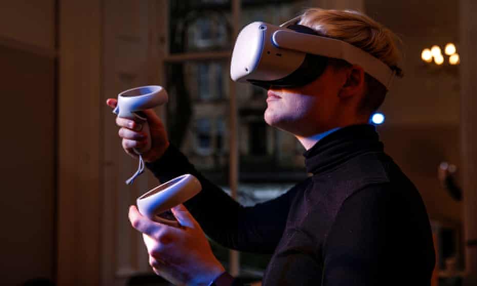 Keza Macdonald uses a VR headset at home in Glasgow.