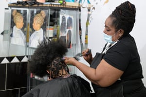 Dee, from E5 Hair Doctor in Clapton, working on Carlos’s plaits