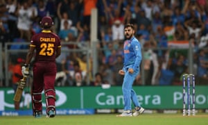 Virat Kohli celebrates after breaking the Charles and Simmons’ partnership with his first delivery.