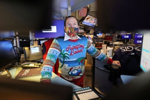 Trader Michael Pistillo Jr wearing a festive sweater on the floor of the New York Stock Exchange yesterday.