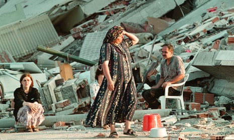 People among the ruins of their collapsed apartment block after earthquake in Turkey in August 1999