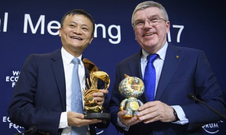 The IOC president Thomas Bach, right, and Jack Ma, executive chairman of the Alibaba Group, on Thursday.