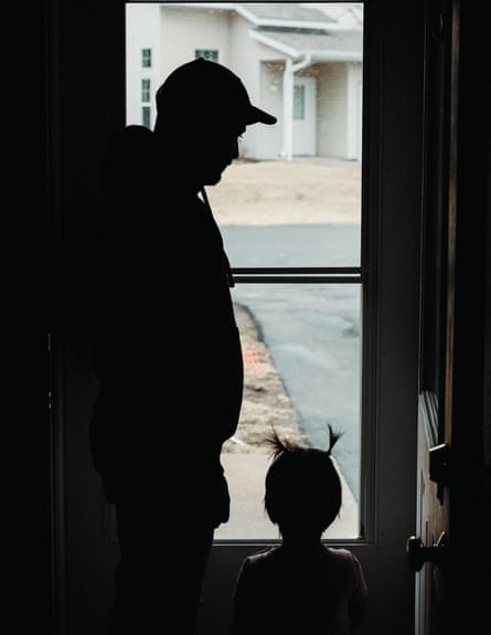 a silhouette of a man and a little girl