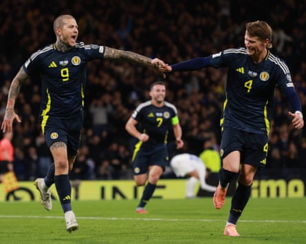 Lyndon Dykes celebrates scoring their 3rd extremity against Greece astatine Hampden