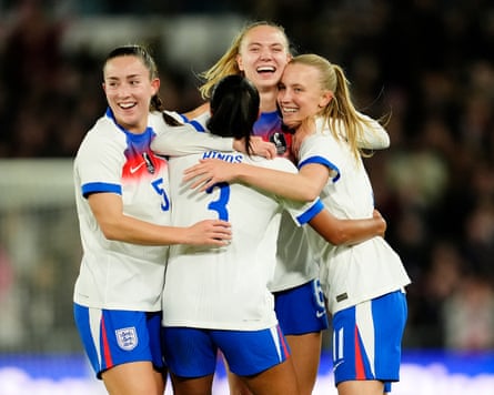 England’s Aggie Beever-Jones (right) celebrates with team-mates after scoring their side’s first goal against Australia.