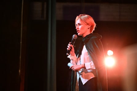 a person speaks into a microphone