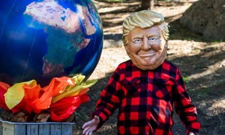 Oxfam activists portrayed the G7 leaders, including US President Donald Trump, standing next to a burning Earth during the G7 Summit in Quebec City, Canada in June 2018. 