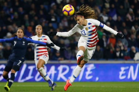 USA’s Alex Morgan heads the ball during the match against France at Stade Océane.