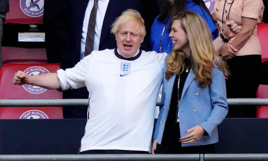 Boris Johnson at the Denmark semi-final with his wife, Carrie Johnson.