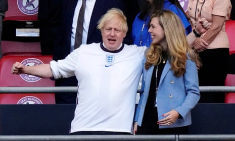 Boris Johnson at the Denmark semi-final with his wife, Carrie Johnson.