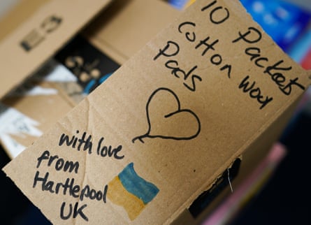 A message is written on a box of donated goods at a community hub in Hartlepool