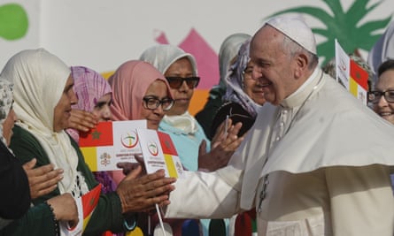 Pope Francis greets women in Morocco, as part of a trip aimed at showing solidarity with migrants at Europe’s door.