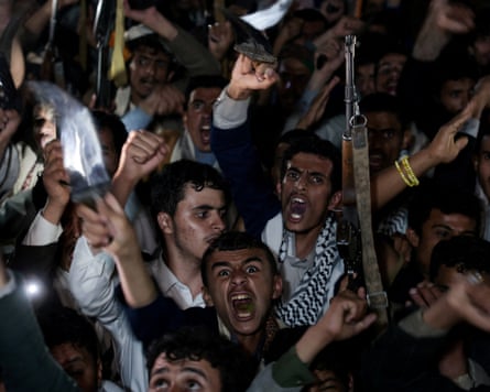 A crowd of men shouting